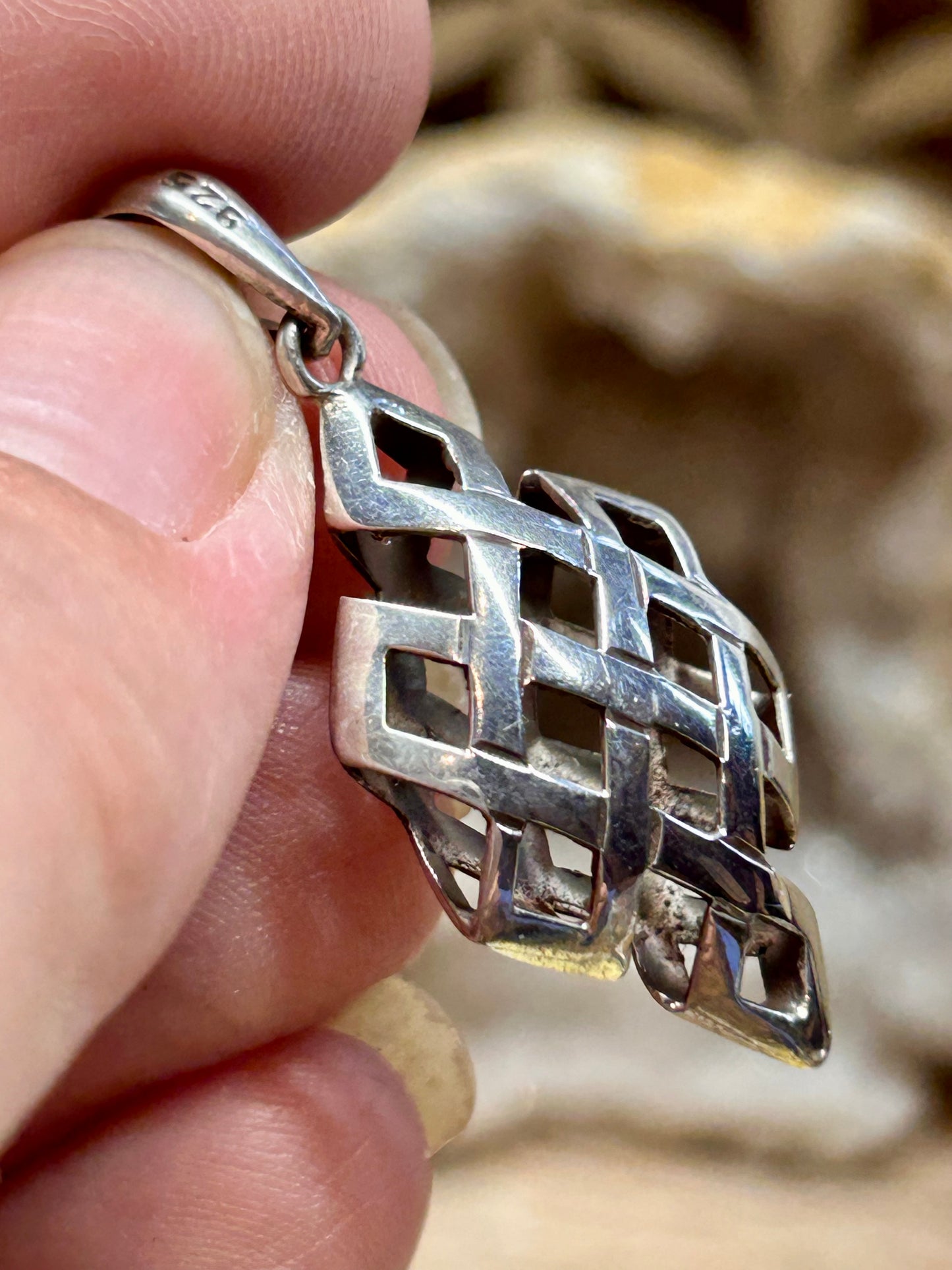 Pendentif de noeud sans fin