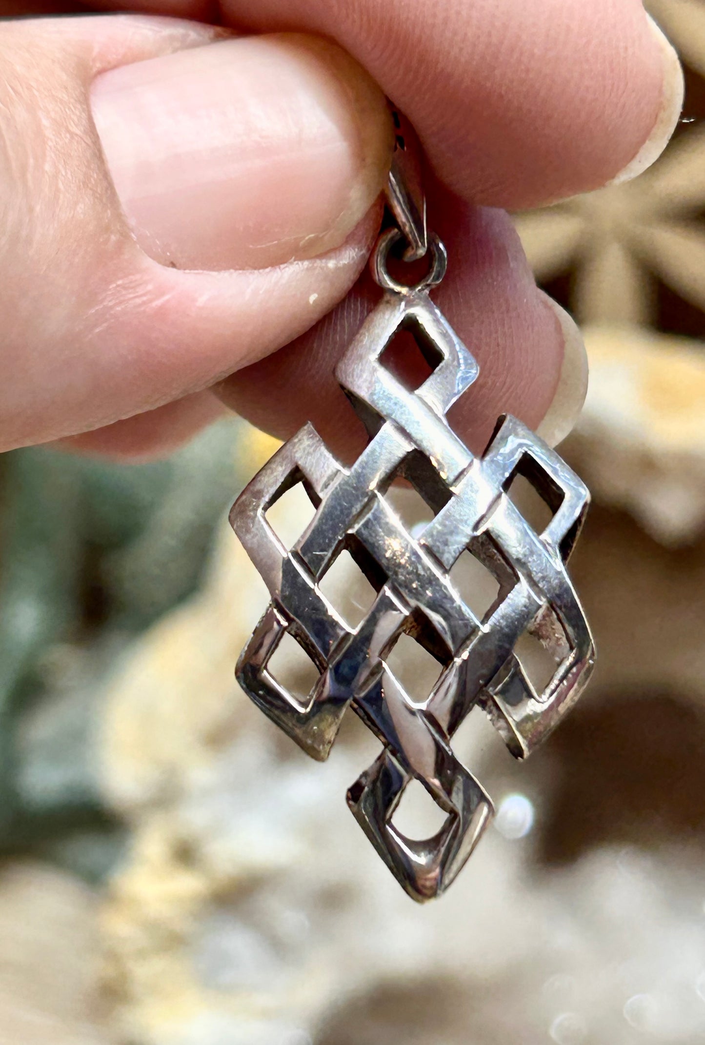 Pendentif de noeud sans fin