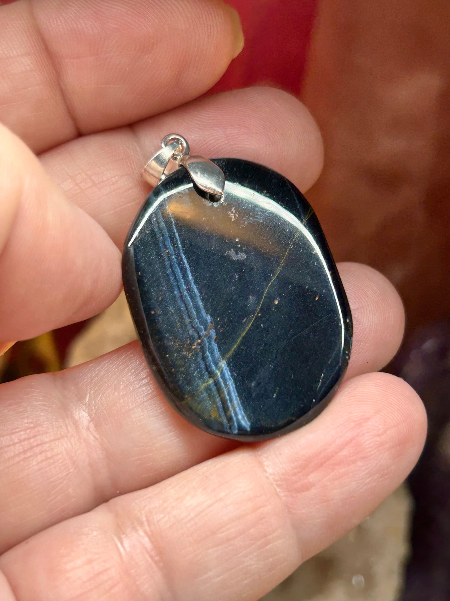 Pendentif d’œil de faucon