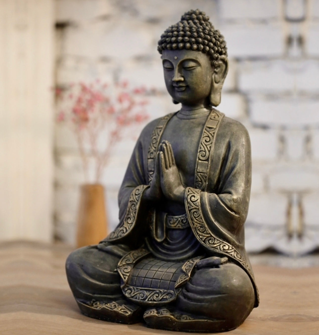 Statue Bouddha en prière