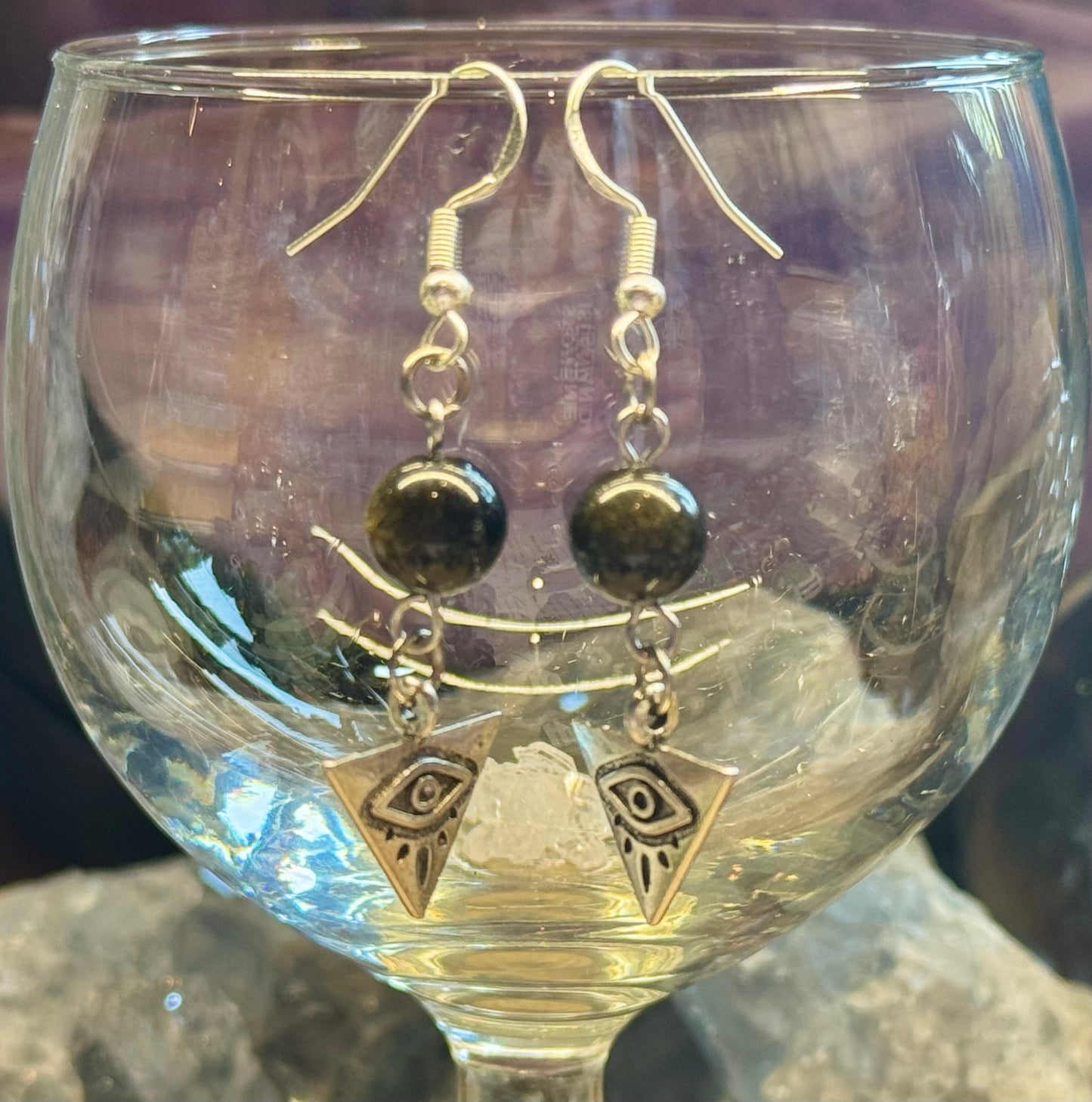 Boucles d’oreilles pendantes Obsidienne Dorée et Oeil d’Horus