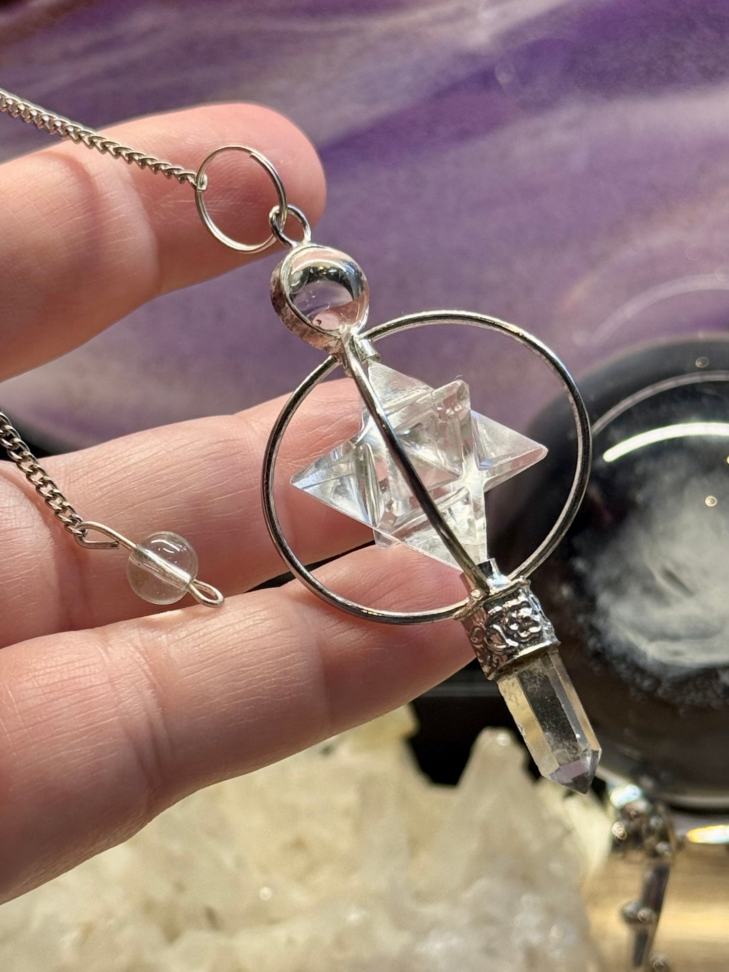 Pendule en cristal de roche Pointe et Merkaba cerclée