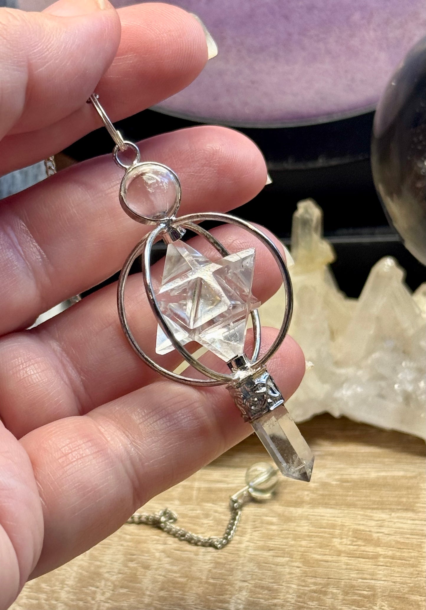 Pendule en cristal de roche Pointe et Merkaba cerclée