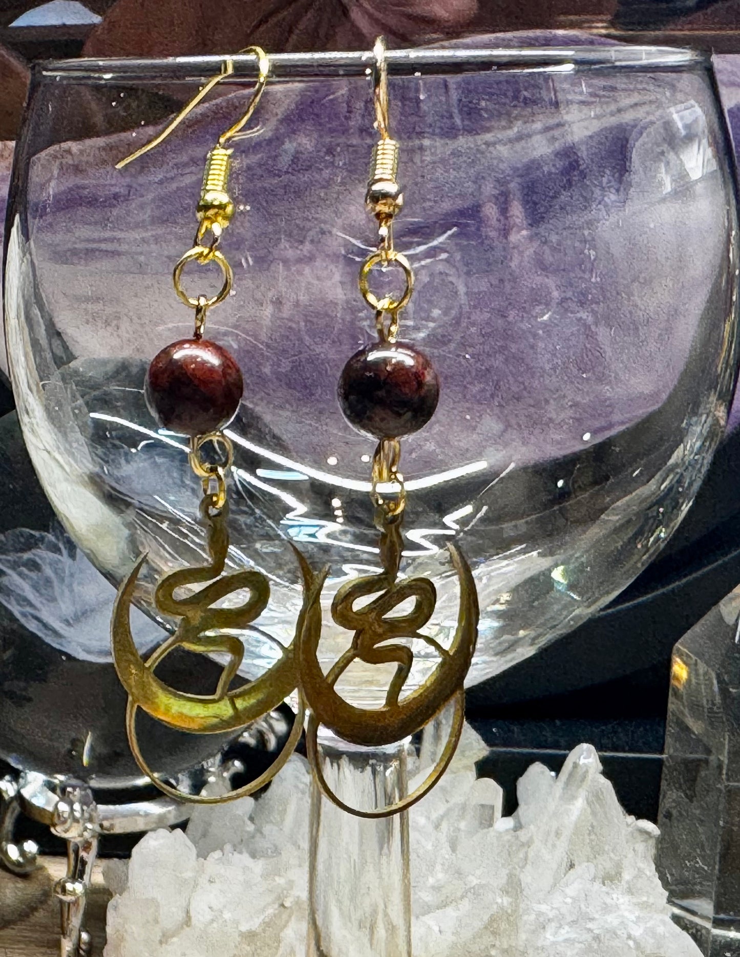 Boucles d’oreilles dorées serpent