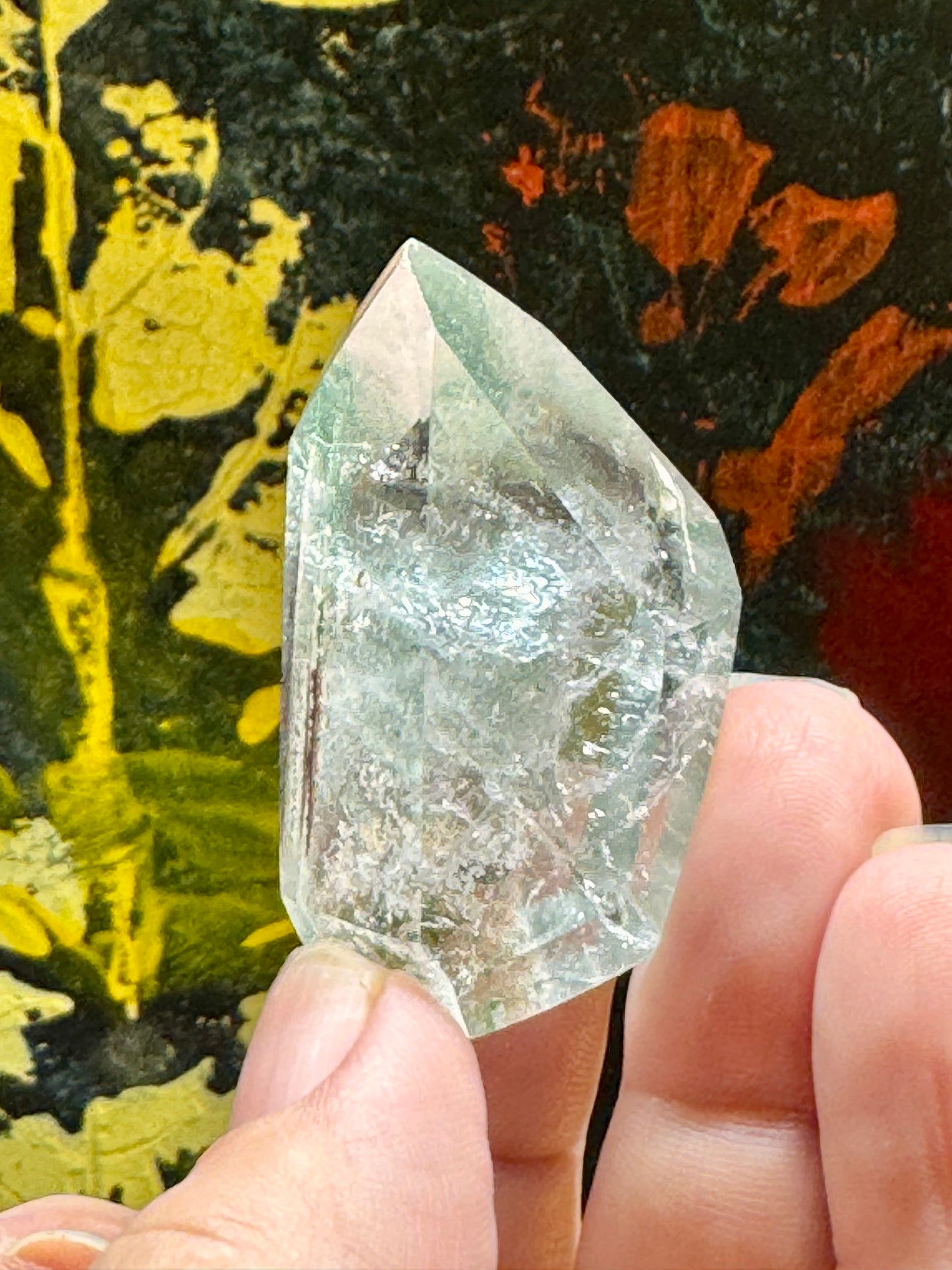 Pointe biterminée de quartz blanc avec inclusions
