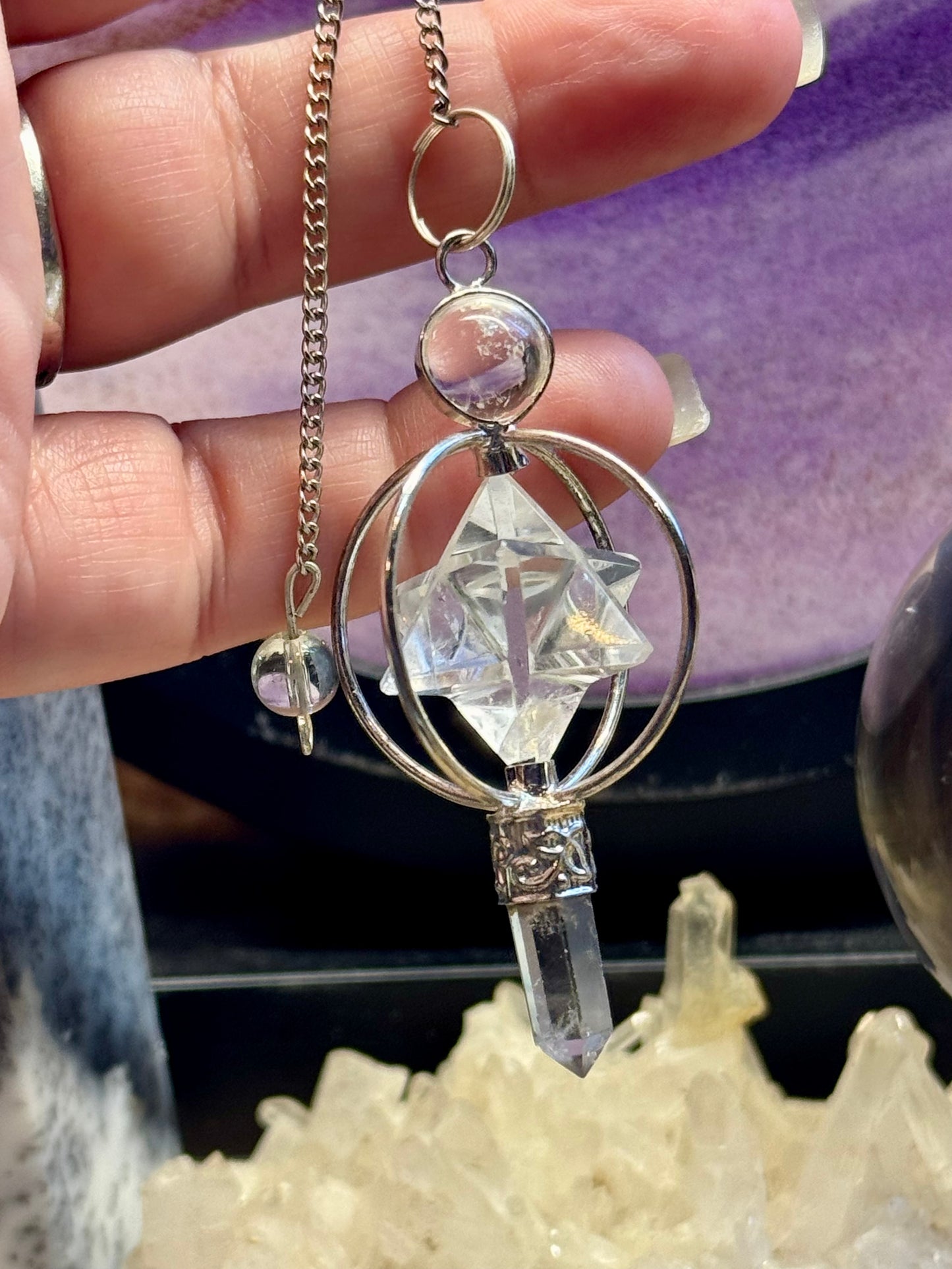 Pendule en cristal de roche Pointe et Merkaba cerclée