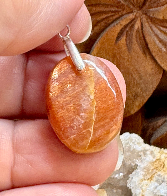 Pendentif de pierre du soleil extra