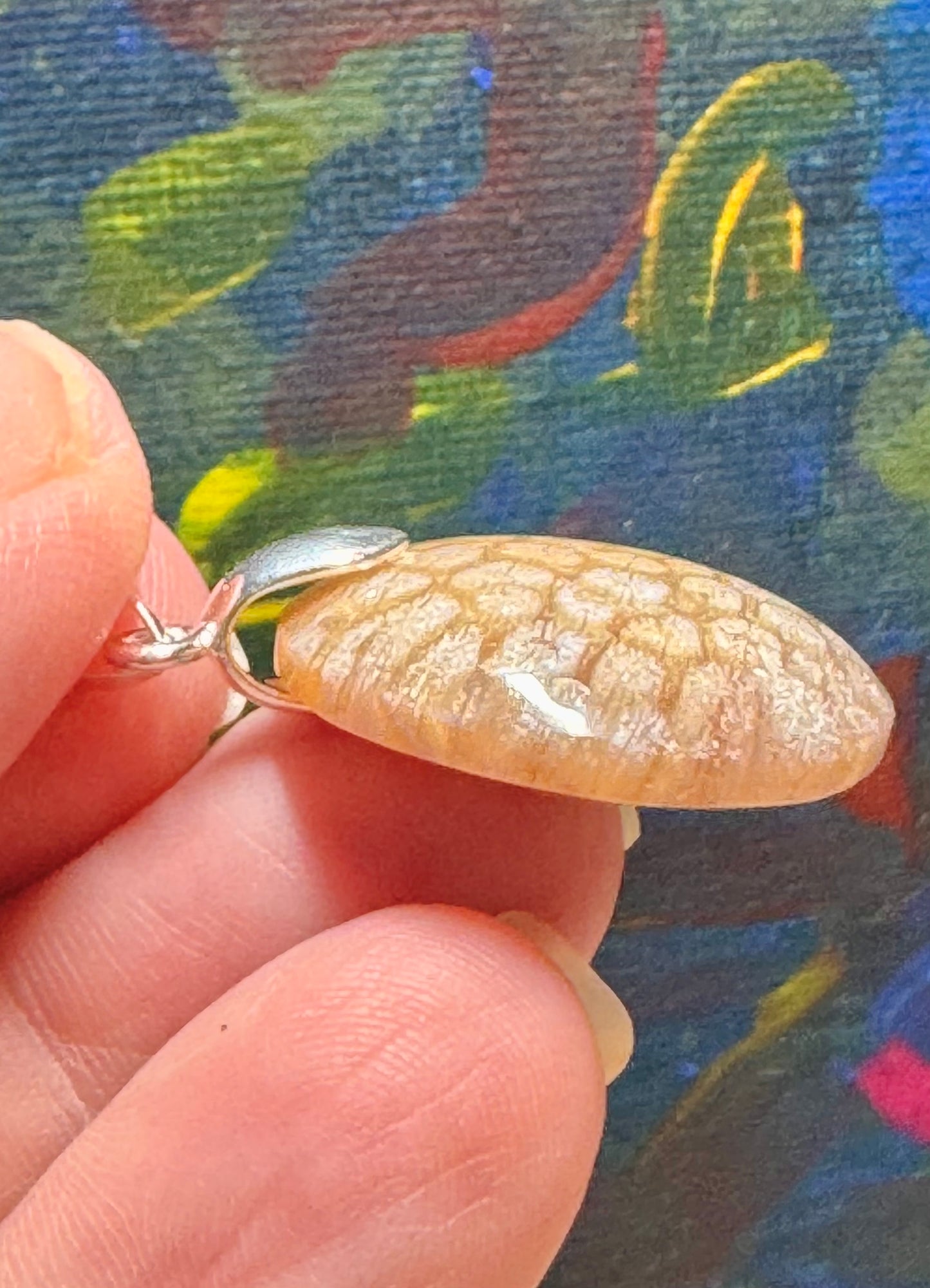 Pendentif de corail fossilisé