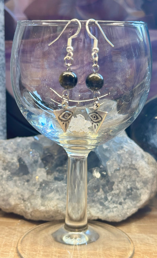 Boucles d’oreilles pendantes Obsidienne Dorée et Oeil d’Horus