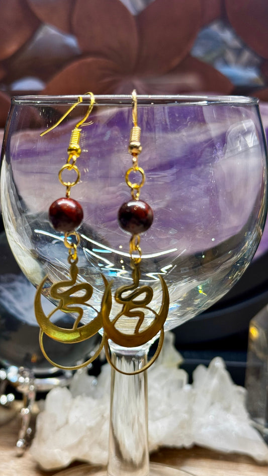 Boucles d’oreilles dorées serpent