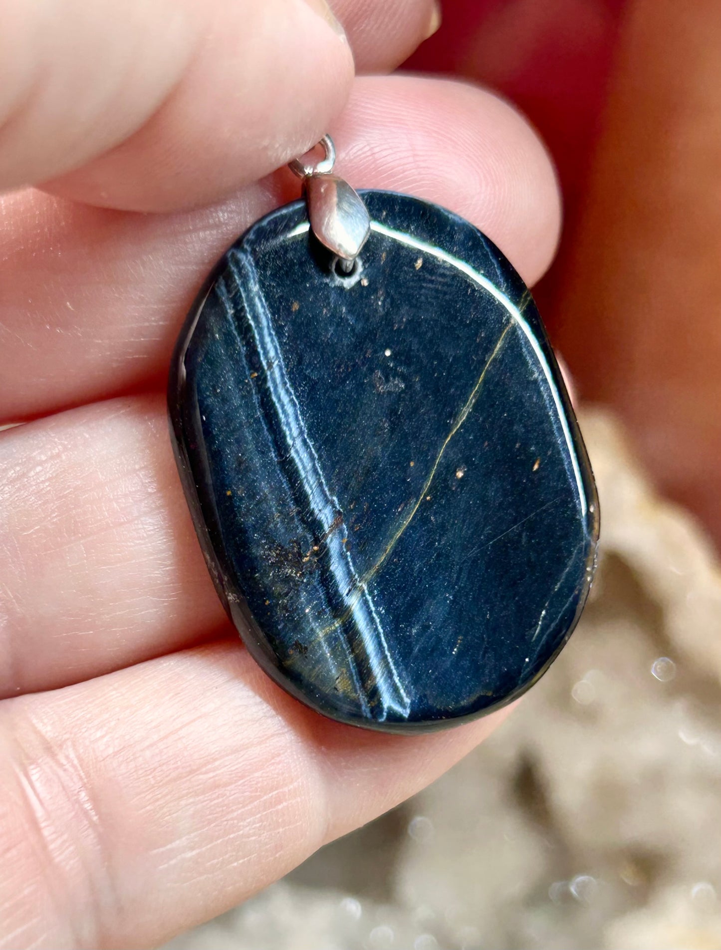 Pendentif d’œil de faucon