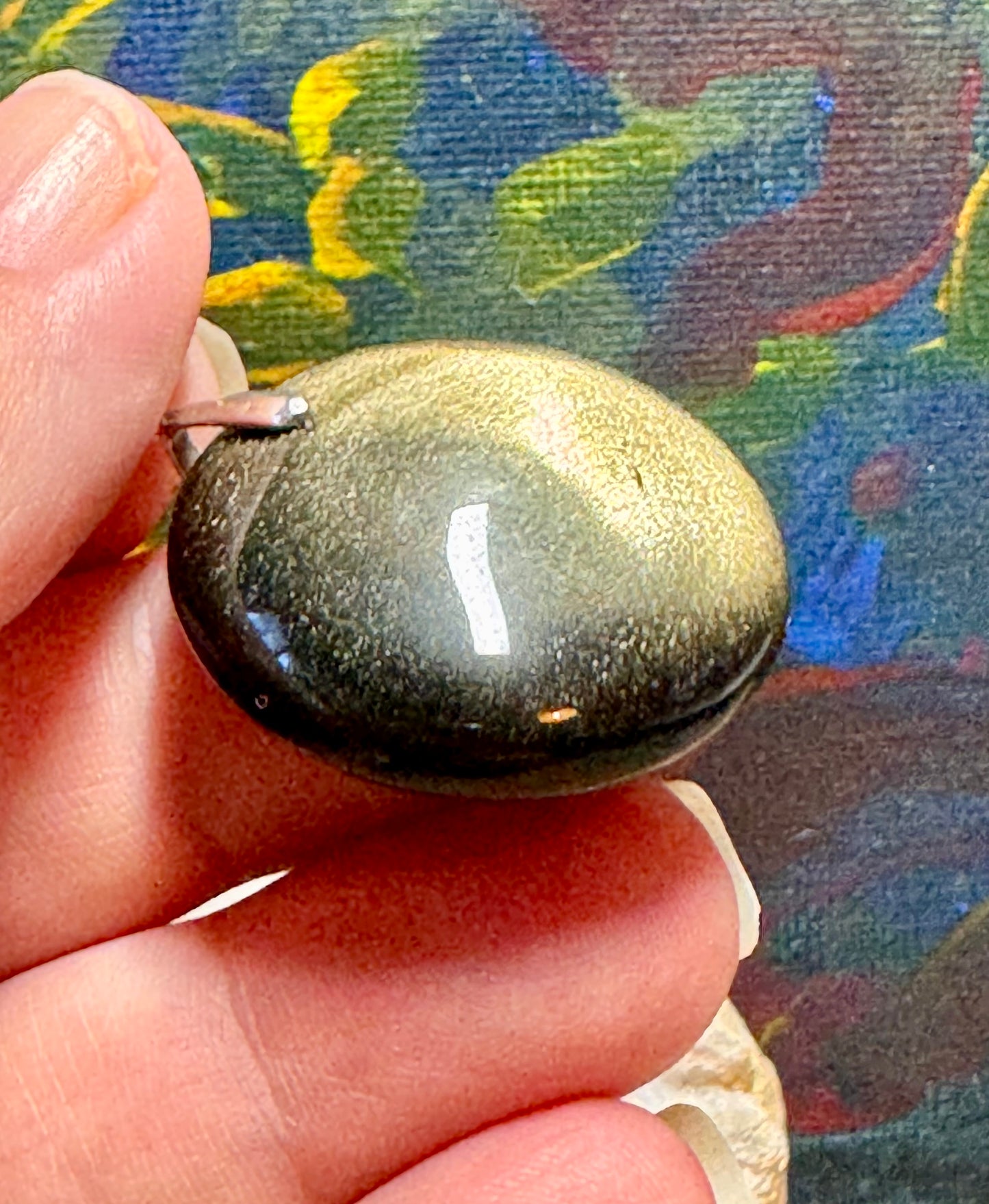 Pendentif en obsidienne dorée