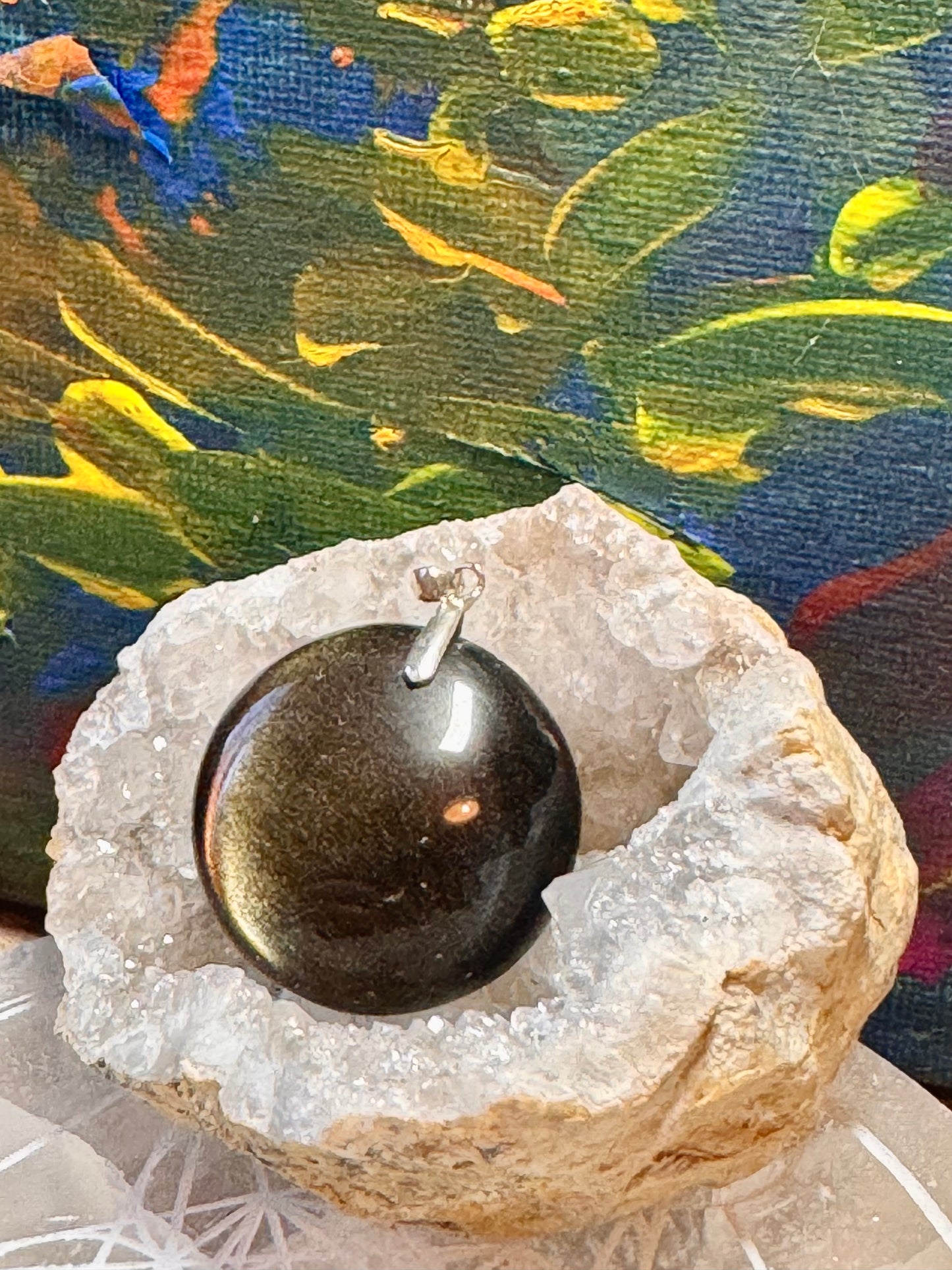 Pendentif en obsidienne dorée