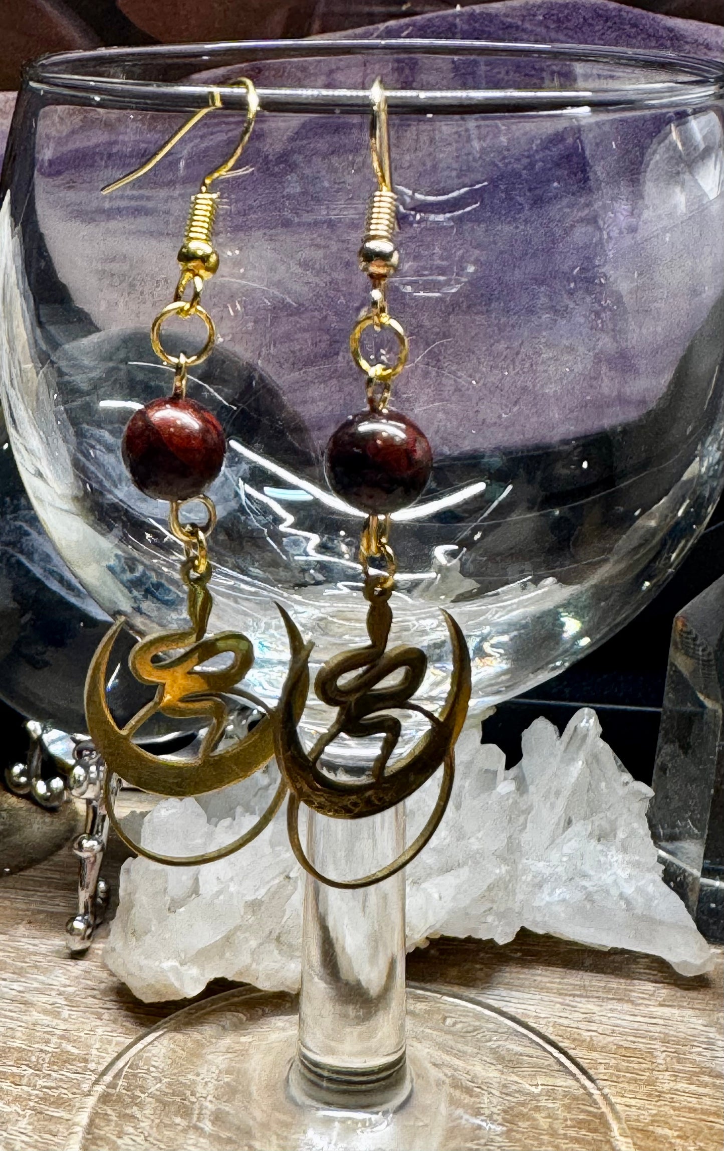 Boucles d’oreilles dorées serpent