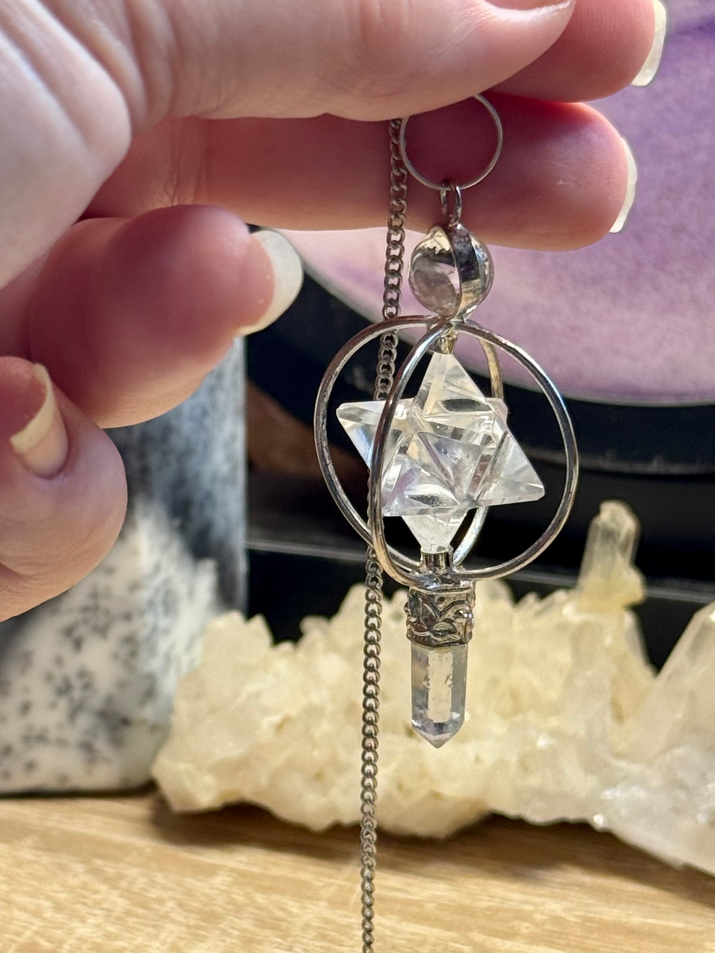Pendule en cristal de roche Pointe et Merkaba cerclée
